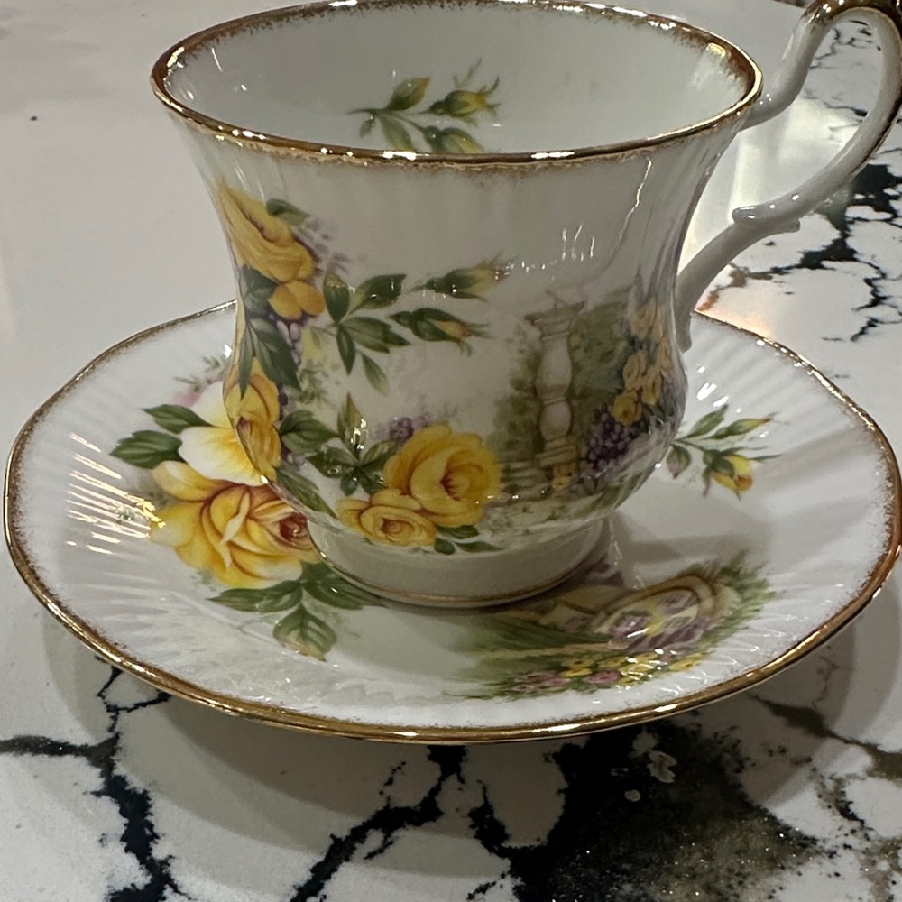 Porcelain English Tea Cup and Saucer Set with Yellow Rose Pattern and Gold Trim